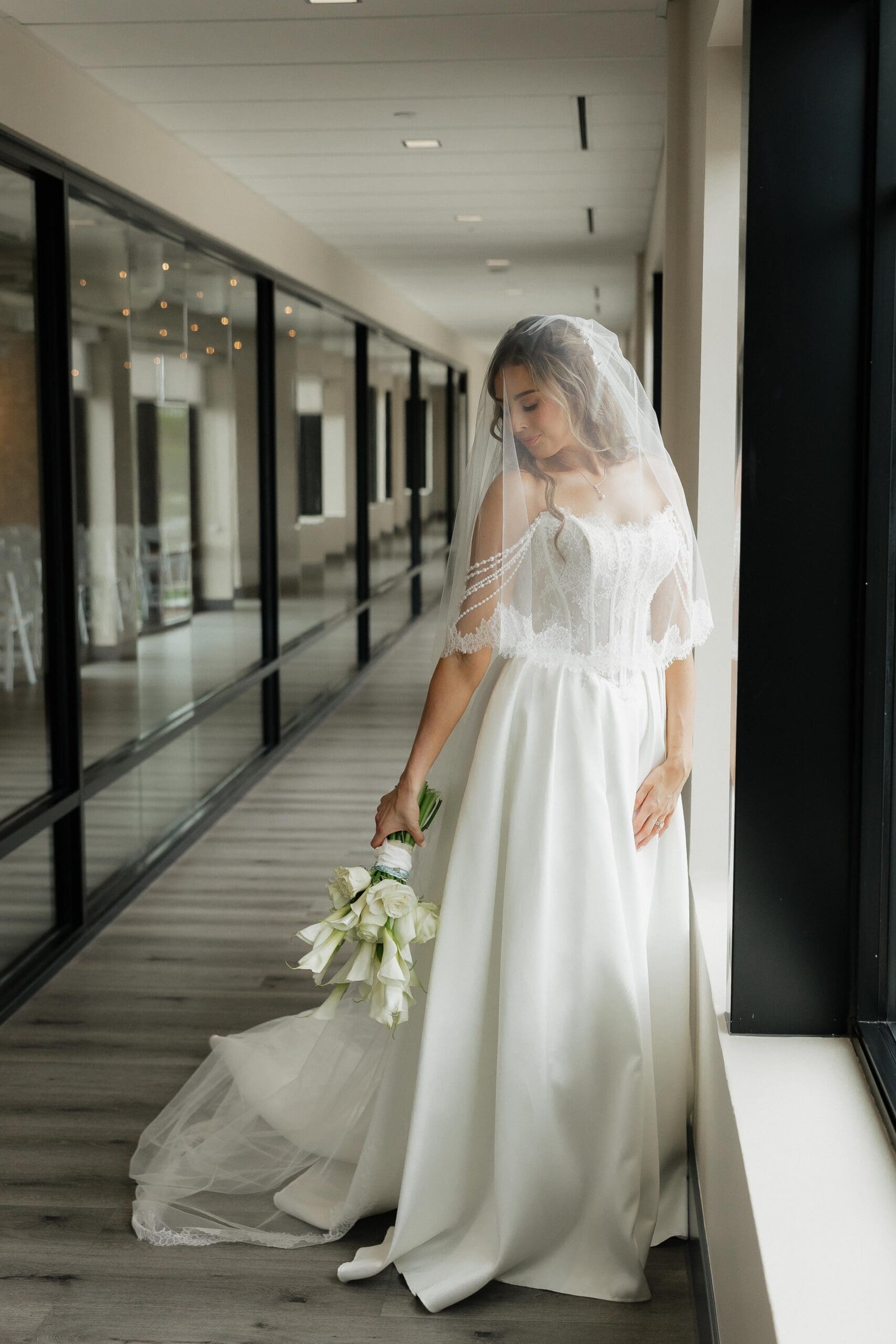 Under the veil Bride Portrait. Toast Venue. Ankeny, Iowa